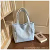 Bolso de mano de alta gama nuevo para mujer, moderno y a la moda, elegante bolso de axila, casual y versátil para ir al trabajo y de compras, bolso de hombro