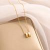 Collar de acero de titanio con colgante de ojo de gato de lujo ligero de estilo japonés y coreano, collar de clavícula con diseño simple y elegante para mujer.