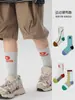 Calcetines para niños ZYZ al por mayor otoño nueva letra calcetines para correr para niños calcetines de tubo deportivos de ocio de goma alta para niños