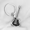 Transfronterizo en stock Venta al por mayor Creativo Instrumento Musical Colgante Actividad Bolsa de Regalo Colgante Metal Pintura Guitarra Llavero