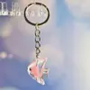 Nuevo Colgante Creativo de Bolsa con Cara Sonriente de Pulpo Brillante Dibujo Animado Pequeño Regalo Llavero de Moda Anillo de Llave