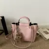 Bolsa de Hombro Cruzada para Mujer 2026 Nueva Vintage Texturizada Moda Tendencia Simple Gran Capacidad Versátil Bolso Cubo