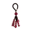 Al por mayor Mineral Crudo Natural Alto Contenido Cinabrio Oro Púrpura Torre Wen Chang Llavero de Bolígrafo Accesorios de Colgante para Bolsos Creativos Culturales Tendencia Nacional Más Vendidos