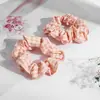 Nuevo anillo de intestino grueso a cuadros, popular en Internet, estilo coreano, anillo de pelo de intestino grueso con forma de corazón para niña, anillo de intestino grueso con cola de caballo y cerdo estampado a color estilo coreano.
