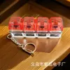 Varios Colores, Sin Luces, Llavero de Teclado Mecánico Cuatro en Uno para Aliviar el Estrés, Colgante para Mochila, Juguete para Aliviar el Estrés