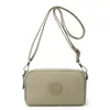 Bolsa de lona para teléfono móvil para mujer, minibolso cruzado, nuevo modelo 2026, monedero de muñeca, bolso de mano impermeable