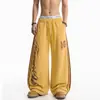 Calça de moletom casual larga e despojada com estampa de leopardo, estampa de letras e listras, estilo de rua americano, subcultura, para homens e mulheres