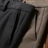 Pantalones de lana gruesa elástica para hombre de otoño e invierno 2023 pantalones de lana cepillada de alta gama rectos holgados de negocios casual