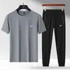Conjunto de Verão Masculino Novo para Casal Transfronteiriço Camiseta de Seda Gelada Respirável Fresca Calça Longa Esportiva Casual Conjunto de Duas Peças para Homem