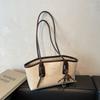 Bolsa retrô externa única de alta qualidade feminina 2024 nova moda outono e inverno textura bolsa de ombro popular bolsa de axila para deslocamento