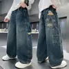 Pantalones Vaqueros para Niños Primavera y Otoño 2026 Estilo Nuevo Pantalones Rectos de Pierna Ancha para Niños, Pantalones Largos Sueltos con Graffiti para Niños Mayores