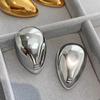 Europa e Estados Unidos exagerados brincos grandes de metal liso femininos luxo leve nicho senso de alta qualidade brincos moda feminina brincos de temperamento atacado