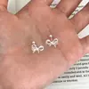 Pendientes Coreanos S999 de Plata Pura con Lazo Sencillo para Mujer, Diseño de Nicho con un Toque de Alta Gama, Accesorios Versátiles para Orejas que Son Suaves con los Agujeros