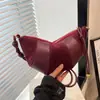 Bolsa de Dumpling Moda Casual Vintage Fosca Nova 2026 para Mulheres, Bolsa de Ombro Único com Design de Chifre de Alto Padrão, Bolsa Transversal