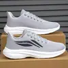 Zapatos transpirables de malla tejida de punto de gran tamaño transfronterizos para hombre, populares zapatos casuales de moda de verano y otoño, zapatos deportivos simples versátiles
