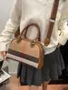 Bolso con Estampado de Rayas para Mujer 2026 Nuevo Estilo de Lujo Ligero Versátil para Viajar al Trabajo Bolso de Hombro Cruzado Transfronterizo