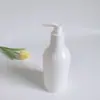 Botella de plástico blanco porcelana de 500 ml material PET empaque líquido Botella botella de champú gel de ducha botella de loción con dispensador