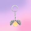 Llavero con diseño de girasol en blanco con impresión láser a color, ideal como regalo navideño, colgante de metal con letras