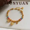 Novo Estilo Nova Moda Chinesa Exquisito Pulseira de Couro Dourado Areia com Pônei, Luxo Leve, Sensação de Alto Padrão, Joia de Mão Versátil de Nicho para Mulheres