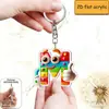 Chaveiro de anime com olhos grandes 2D transfronteiriço, acessório para chave de carro com gravação de 26 letras, pingente fofo para decoração de bolsa