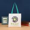 En stock venta al por mayor bolsa de lona portátil regalo publicitario bolsa de algodón institución de capacitación tutorial bolso de hombro se puede personalizar logo