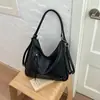 Bolso de hombro liso nuevo para principios de otoño de 2026 para el trabajo y los desplazamientos, bolso cruzado personalizado informal de gran capacidad a la moda