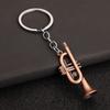 Instrumentos Musicales Mini al por Mayor Transfronterizos, Saxofones de Juguete en Miniatura, Colgantes para Llavero Metálicos Mini, Regalos Musicales en Stock