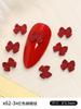 Joyería de uñas con lazo rojo mini roja en línea japonesa al por mayor diy punta del dedo aleación pequeños accesorios decoración de uñas