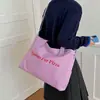 Bolso tote de gran capacidad de alta gama para mujer para otoño e invierno, nuevo modelo 2026, bolso de hombro de color liso con letras