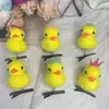 Arco tridimensional primavera pequeno amarelo pato grampo de cabelo pequeno chapéu desenho animado pequeno pato para empurrar pequeno presente fábrica outlet