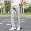 Calças Casuais Masculinas 2026 Novo Estilo Quatro Estações Business Retas Largas Cor Sólida Calças Longas Outono Calças Esportivas Masculinas
