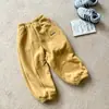 [Liquidação] Calças Quentes Bordadas em Fleece da Moda de Inverno 2025 para Meninos e Meninas, Macias e Confortáveis com Punhos Elásticos