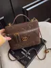 Bolso Retro Ropa de Trabajo para Mujer Otoño e Invierno 2025 Nueva Moda Bolso Bandolera Sencillo Lonchera Bolso Cruzado de Cadena Acolchado