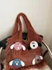 2025 Nuevo Bolso de Mujer Tejido Versátil de Hombro Único de Punto Popular de Comercio Exterior Otoño e Invierno con Bloques de Color Artísticos y Borlas