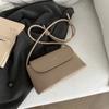 Bolso de diseño de nicho de Corea del Sur para mujer, nuevo bolso bandolera cuadrado pequeño con lazo de alta gama, portátil y de moda para otoño de 2024.
