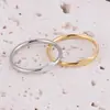 Anillo delgado plano liso simple de nuevos productos transfronterizos anillo de pareja de acero inoxidable europeo y americano grabado con láser de acero de titanio