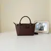 2026 Bolso Pequeño Nuevo para Mujer Bolso de Mano Tejido Tipo Dumpling Versátil Moderno de Alta Calidad Bolso de Mano Bolso de Hombro Bolso Cruzado
