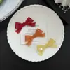 Fábrica de origen, falda de color liso hueca, dobladillo, accesorios de lazo de acetato, productos semiacabados hechos a mano para bricolaje, en stock para personalización