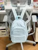 Mochila Escolar Menina 2026 Novo Estilo Mochila de Viagem Bolsa de Nylon Feminina Versátil Casual Mochila de Grande Capacidade Bolsa de Ombro