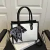 Bolsa Grande de Nicho Estilo Coreano para Mulheres 2026 Novo Modelo Bolsa de Ombro Único Transversal com Textura, Adequada para Aula e Trabalho Bolsa Tote