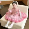 Conjunto de dos piezas de vestido suéter de dibujos animados para niñas de comercio exterior, nuevo traje de estilo coreano de pequeña fragancia para otoño de 2026, ropa infantil de moda