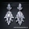 Pendientes de Vestido de Novia Exagerados Elegantes Nuevos con Circonita Brillante Super Brillante de Lujo Ligero Europeo y Americano de Moda Accesorios para Mujer