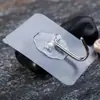 Caja de Pañuelos parche tira sin costuras parche hebilla sin perforaciones adhesivo fuerte estante de almacenamiento soporte para cepillos de dientes pasta adhesiva