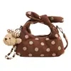Bolsa de mão super popular de bolinhas para mulheres, novo estilo coreano 2026, versátil e estilosa, bolsa de ombro e transversal para o dia a dia e viagens