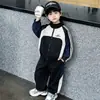Conjunto Esportivo Masculino Primavera e Outono 2026 Novo Tendência Jaqueta Casual Infantil de Primavera Conjunto Elegante de Duas Peças Tendência