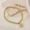 Aogu Amazon Mais Vendido Simples Versátil Banhado a Cobre Ouro 18K Zircônia Coração Geométrico Pingente Pulseira com Contas para Mulheres