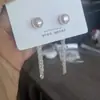 Pendientes de Plata de Ley 925 Antiestil Plata Cara Redonda Perla Borla Larga para Mujer Elegantes Franceses de Lujo Ligero Nicho Pendientes de Borla para Mujer