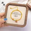 Esperando la nueva serie simple de nicho palabra auspiciosa paz cuentas redondas auspiciosas método antiguo oro pulsera DIY retención de color a largo plazo