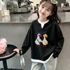 Blusa feminina estilo coreano com trama waffle, falsa peça dupla, manga longa, nova para primavera/outono, versátil e estilosa, de caimento solto, para crianças mais velhas