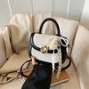 Bolsa de Mão Tecida de Entrada Elegante de Luxo de Nicho Feminina 2025 Nova Moda Versátil para Trabalho Ombro Transversal Sela